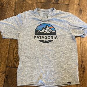 Patagonia (tech/dri fit material but also soft!)